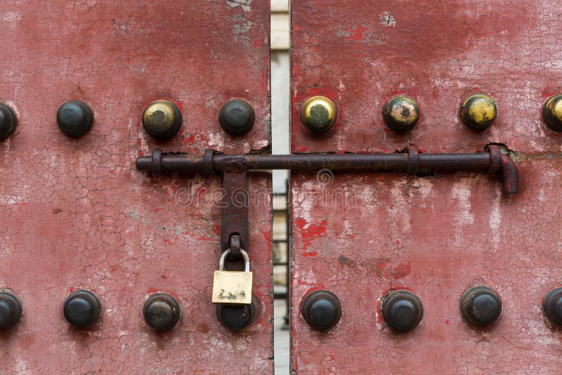 A traditional red chinese door in the Forbidden City. A traditional red chinese door in the Forbidden City