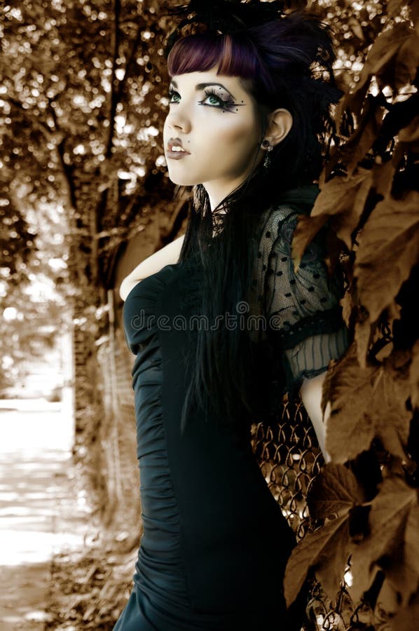 Dark Fall Fashion - Young Woman in Goth Couture. Dark Fall Fashion - Young Woman in Goth Couture