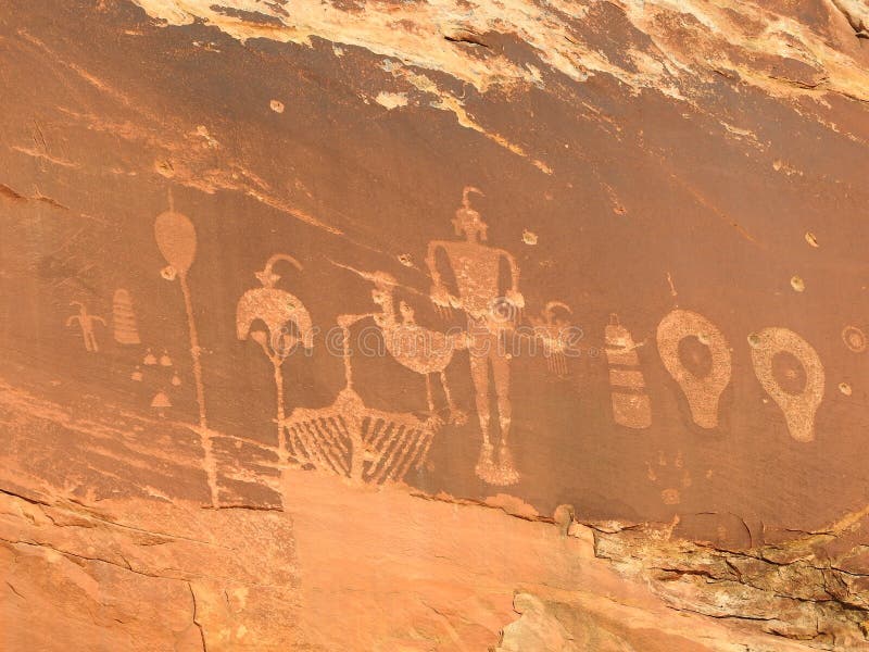 Alte Petroglyphen in Utah Wolfman-Platte lizenzfreie stockbilder