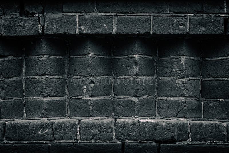 Alte schwarze Maurerarbeit - Ziegelsteinecken - dunkelgrauer Hintergrund lizenzfreies stockbild Alte schwarze Maurerarbeit - Ziegelsteinecken - dunkelgrauer Hintergrund lizenzfreies stockbild