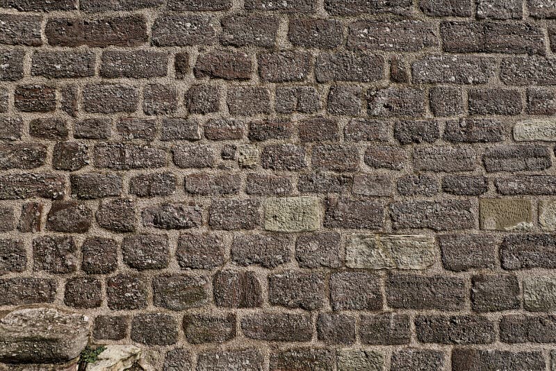 Alte verwitterte Backsteinmauer lizenzfreie stockbilder