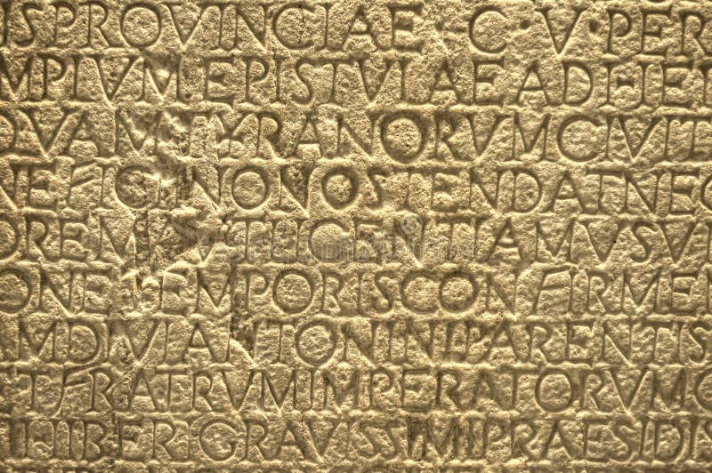 Alte Zeichen des griechischen Schreibenstextes auf der Wand lizenzfreies stockbild