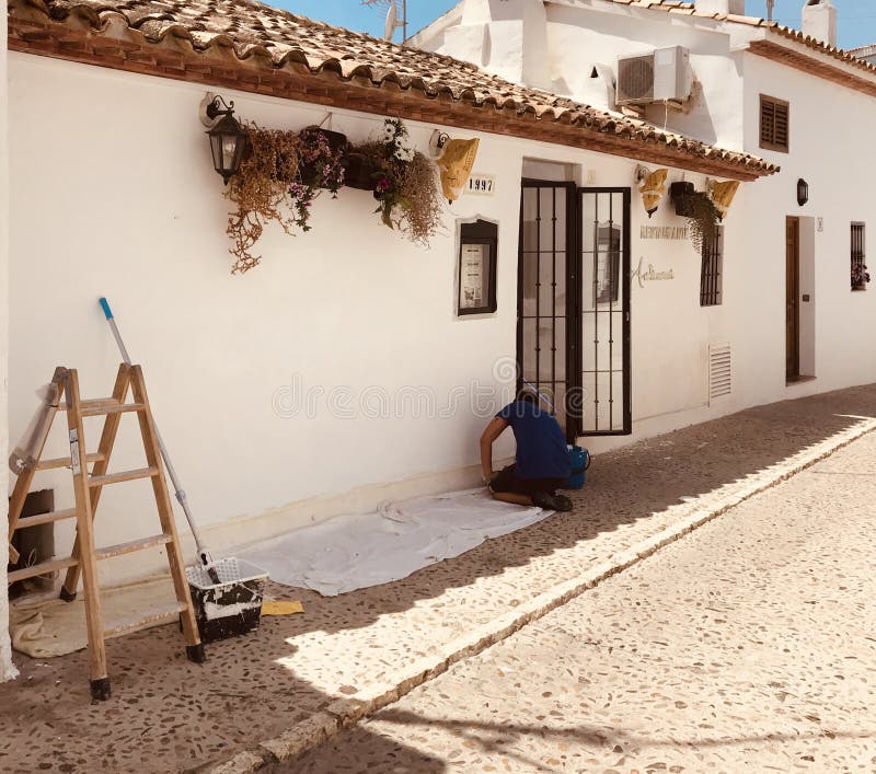 Altea, Spain, 02,06,2020Painter Man, Painting the Restaurant Wall