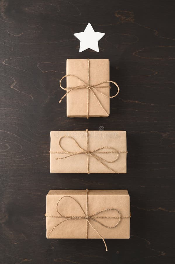 Alternative Christmas Tree Made from Gift Boxes with a White Star on a