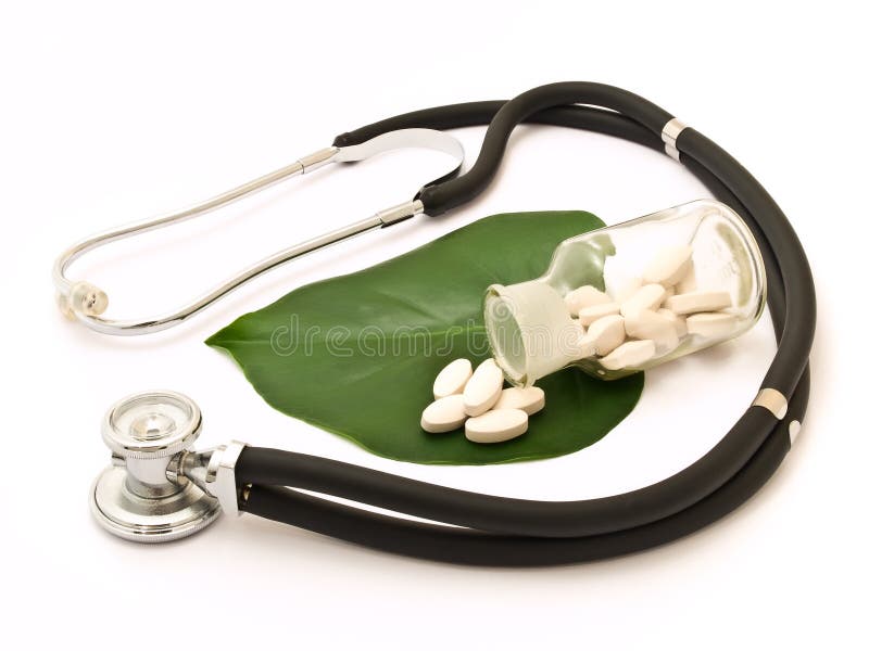 Pills, bottle and stethoscope on the leaf. Green herbal drug medicine stock images, royalty-free photos and pictures