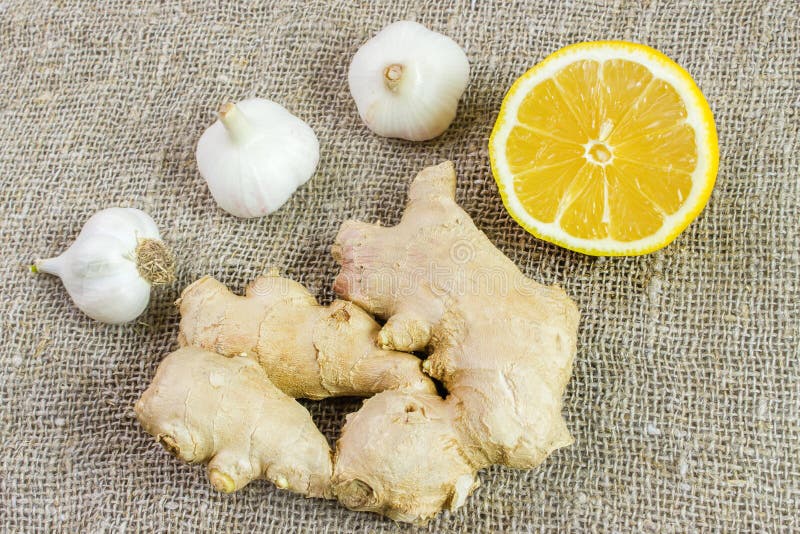 Alternative Medicine with Lemon, Ginger and Garlic Stock Photo Image