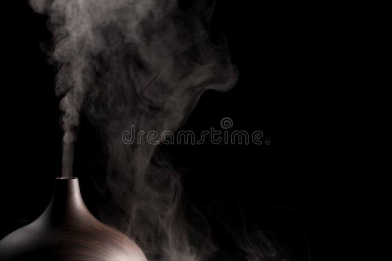 Smoke from Ultrasonic Aroma Diffuser and colorful light on black background.  Color Steam moving in d, Stock Footage