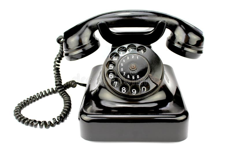 Old rotary phone on white background. Old rotary phone on white background.