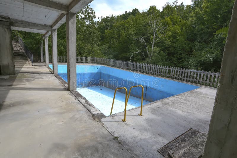 Old empty pool in the closed spa center in central Serbia. Old empty pool in the closed spa center in central Serbia