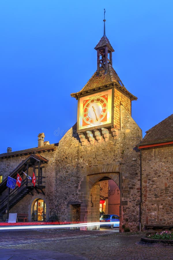 Car motion blur entering the medieval town of Saint-Prex St. Prex in Vaud Canton, close to Morges in Switzerland through the main Town Gate. Car motion blur entering the medieval town of Saint-Prex St. Prex in Vaud Canton, close to Morges in Switzerland through the main Town Gate