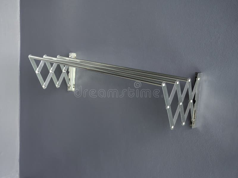 Aluminium Folding Clothes Drying Rack on the Wall. Stock Image Image