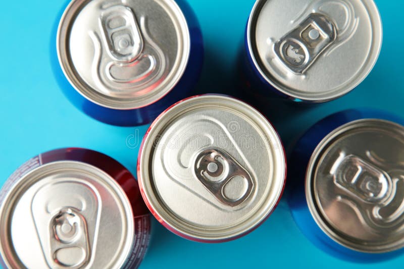 Aluminum Drink or Beverage Cans with Pull Ring on Blue Background Editorial Stock Photo Image