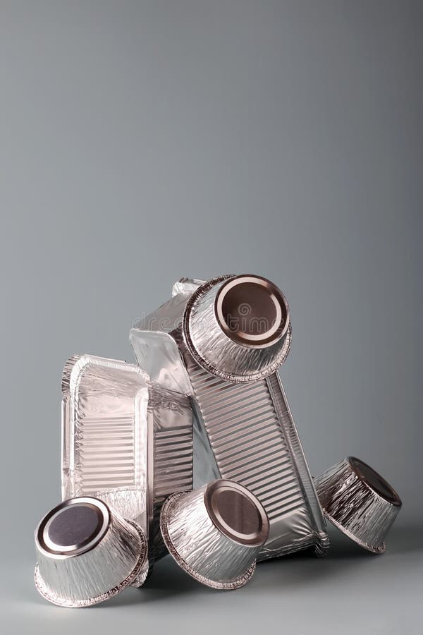 Aluminum Foil Containers for Cooking on a Light Background. Foil