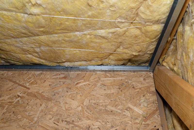 Aluminum Frame with Hangers Placed on Beams in the Attic for Mounting