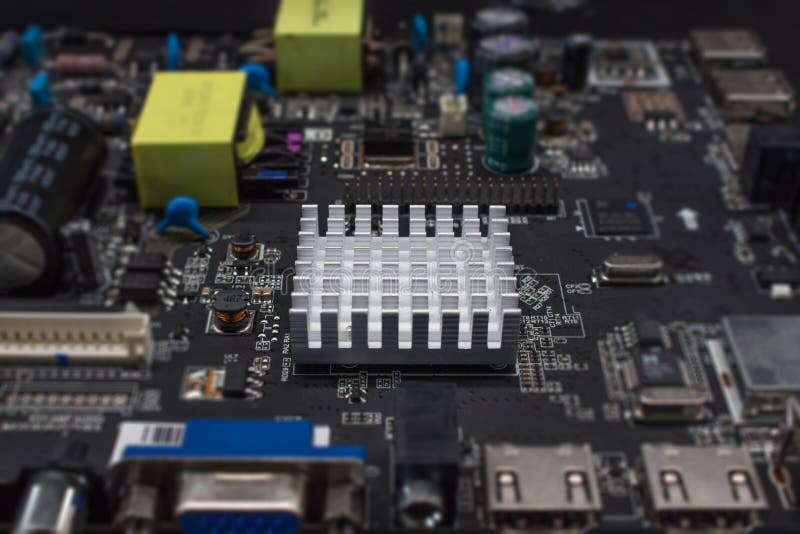 The Aluminum Heat Sink on Electronic Board. Stock Photo Image of