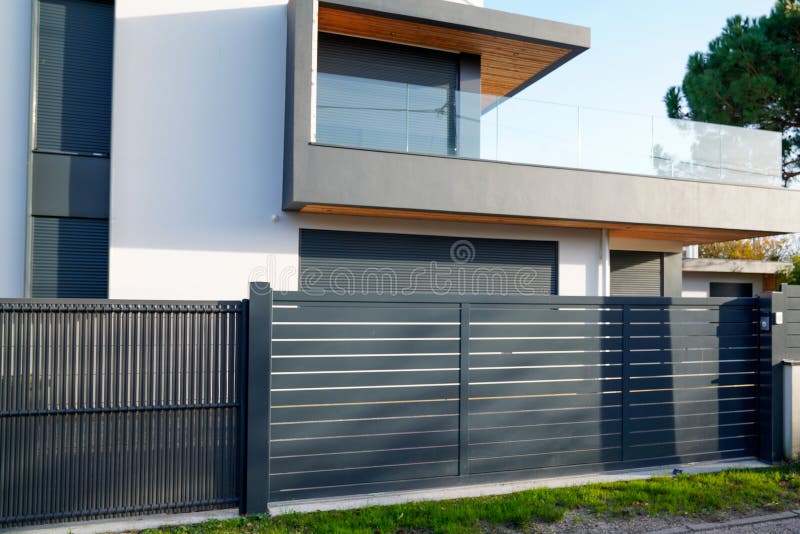 Aluminum Large Car Gate of Modern House in Street View Stock Photo