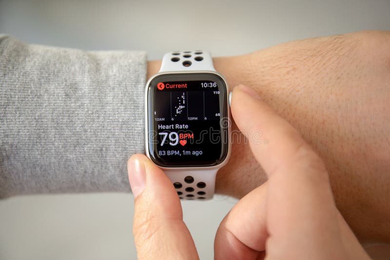 Alushta, Russia - November 6, 2018: Man hand with Apple Watch Series 4 with Heart Rate on the screen. Apple Watch was created and developed by the Apple inc