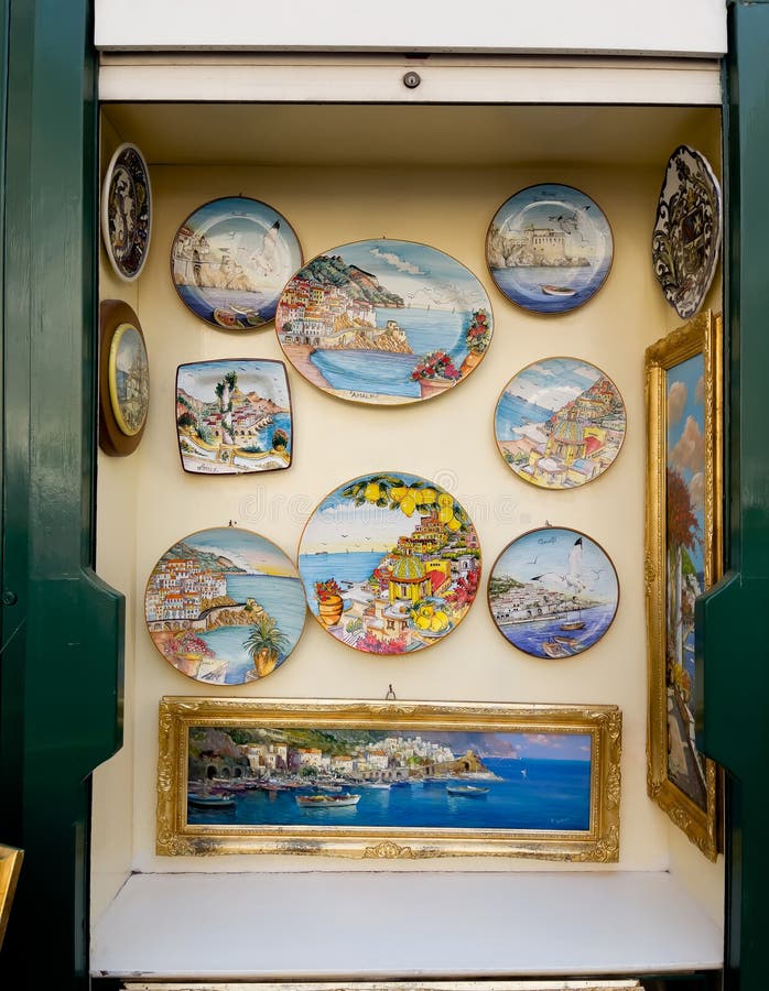 Malaga, Spain- April 03, 2018: Ceramic souvenirs for sale in Malaga, Spain.  Colorful Fridge souvenir magnets Stock Photo - Alamy