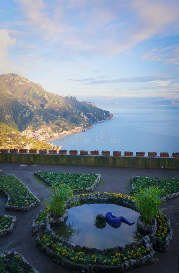 Magically suspended between the blue sky and the iridescent colored sea, the Amalfi coast seems to be born from the palette of a painter who wanted to use the warmer color gradients for creating a landscape that enchants the visitor at the first shot, giving thrilling experience and such evocative view to doubt, for a moment, it is real. It is the land where the sweet scent of lemon blossoms harmonizes itself with the most aromatic one of the Mediterranean vegetation and the acrid aroma of saltiness; where the brilliant colors of the majolica domes, bougainvillea and carnations pergolas give an evident colored touch to the typical whitewashed houses, clinging to the last offshoots of the Lattari Mounts that plunge dramatically into the sea. A vertical landscape, in short, characterized by a picturesque labyrinth of stairways and narrow alleys, connecting the two main elements of this landscape: the mountains and the sea. Magically suspended between the blue sky and the iridescent colored sea, the Amalfi coast seems to be born from the palette of a painter who wanted to use the warmer color gradients for creating a landscape that enchants the visitor at the first shot, giving thrilling experience and such evocative view to doubt, for a moment, it is real. It is the land where the sweet scent of lemon blossoms harmonizes itself with the most aromatic one of the Mediterranean vegetation and the acrid aroma of saltiness; where the brilliant colors of the majolica domes, bougainvillea and carnations pergolas give an evident colored touch to the typical whitewashed houses, clinging to the last offshoots of the Lattari Mounts that plunge dramatically into the sea. A vertical landscape, in short, characterized by a picturesque labyrinth of stairways and narrow alleys, connecting the two main elements of this landscape: the mountains and the sea.