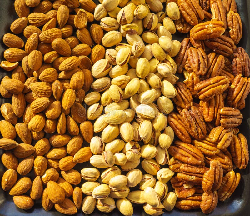 Amandes, pistaches et noix de pécan Nuts, plan rapproché, ensemble illustration stock