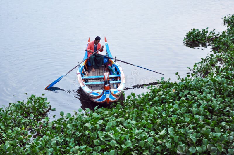 Amarapura, Myanmar - October 9, 2013 : Ferryman on the Taungthaman lake