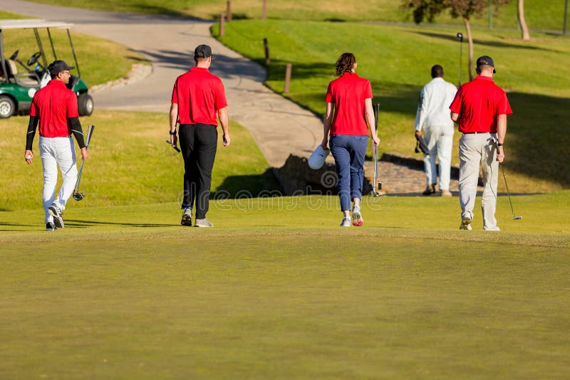 Amateur Golfers Playing A Round Of Golf As A Recreational Pursuit 