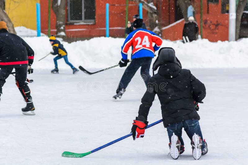 Amateur hockey team plays on the ice