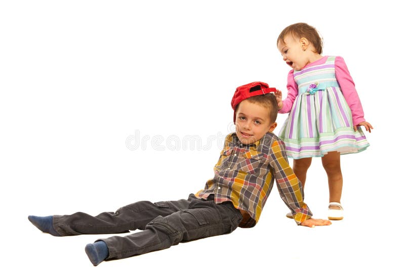 Amazed girl about boy hat stock image. Image of family 27651895