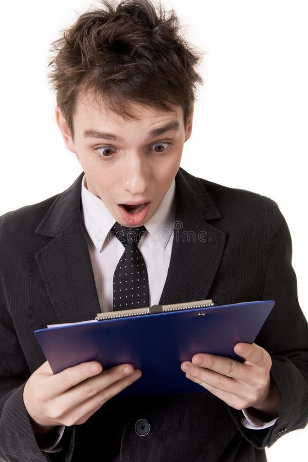 businessman looking at documents shocked
