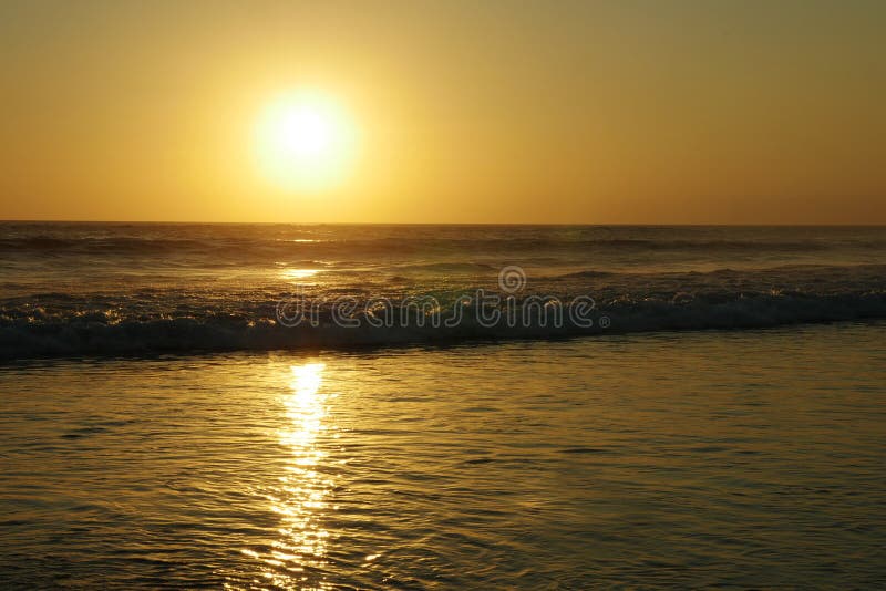 Amazing beautiful sea landscape sunset view of Seminyak Double Six beach in Bali island of Indonesia