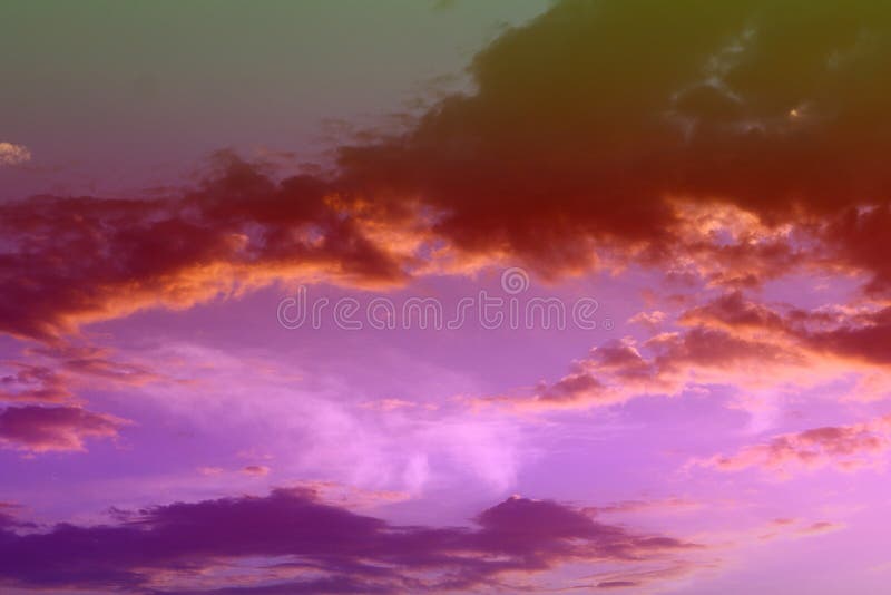 Amazing colorful sun colored clouds in the sky for using in design as background stock photo