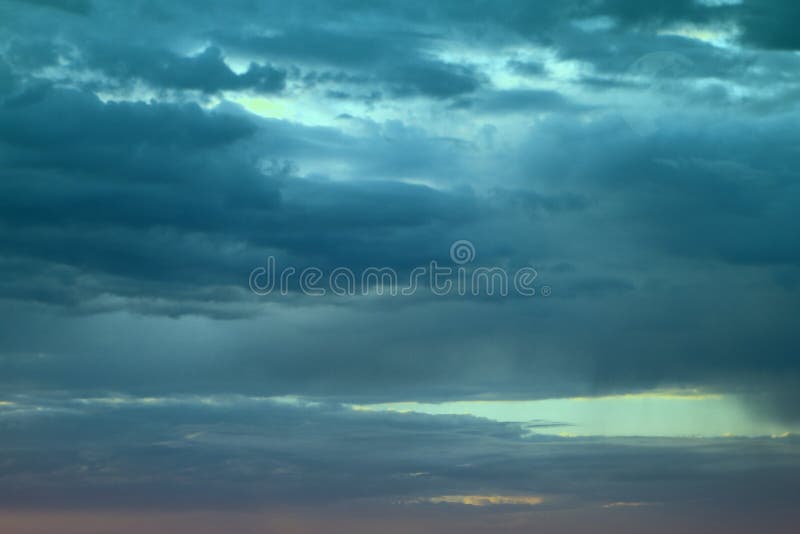 Amazing colorful with sun rays clouds in the sky for using in design as background. royalty free stock image