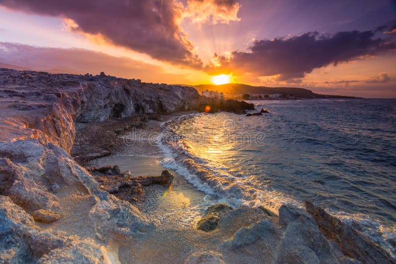 Amazing hidden beach and rocks in Milatos, Crete, Greece during sunset stock images Amazing hidden beach and rocks in Milatos, Crete, Greece during sunset stock images