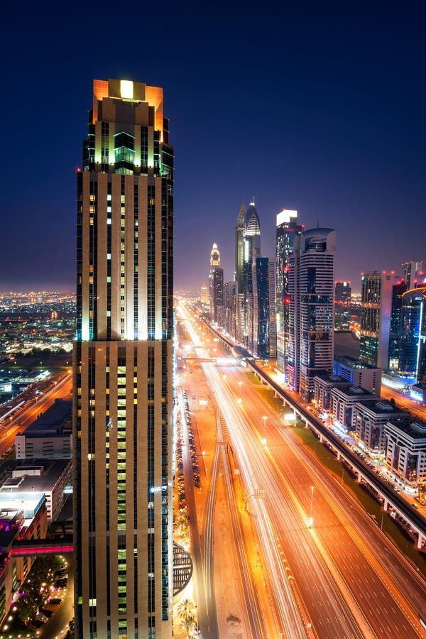 Amazing night dubai downtown skyline and traffic jam during rush hour. Sheikh Zayed road, Dubai, United Arab Emirates stock photography Amazing night dubai downtown skyline and traffic jam during rush hour. Sheikh Zayed road, Dubai, United Arab Emirates stock photography