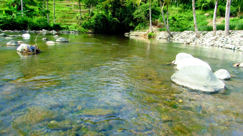 The water is very clear, River in Tasikmalaya Regency, West Java, Indonesia. The water is very clear, River in Tasikmalaya Regency, West Java, Indonesia