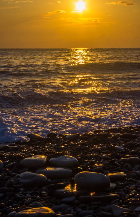 Amazing Sea Sunset On The Pebble Beach The Sun Waves Clouds Stock