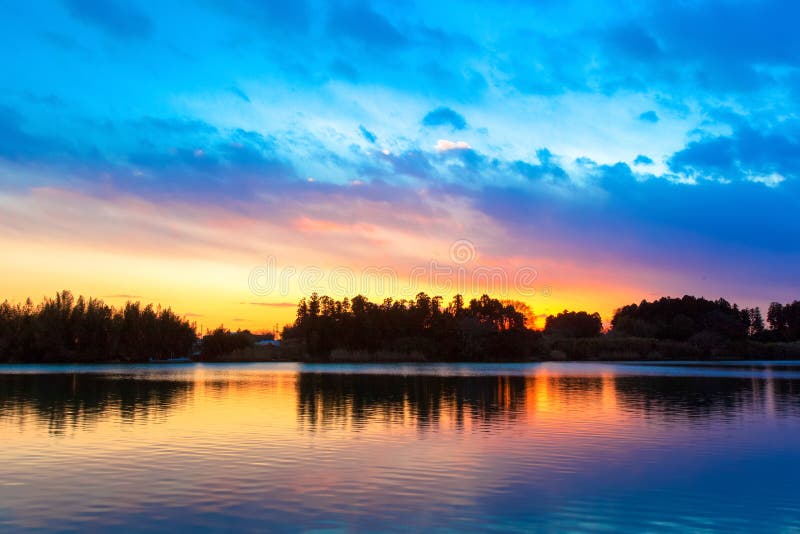 Amazing sunset sky reflection on the river