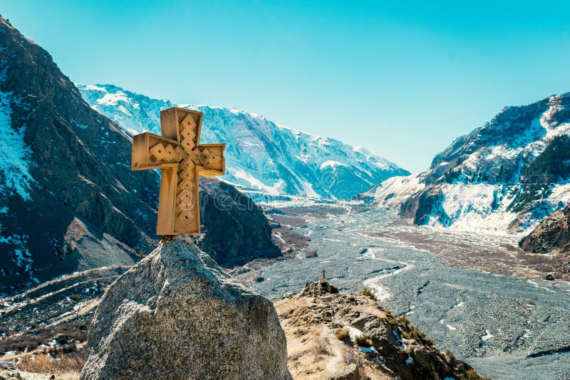 Amazing view alongside Georgian military road, high in the Caucasus mountains. Winter time, high mountain peaks covered with snow