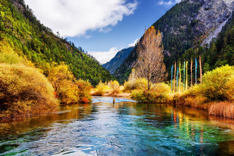 Amazing View Of Scenic River With Crystal Water Among Mountains Stock