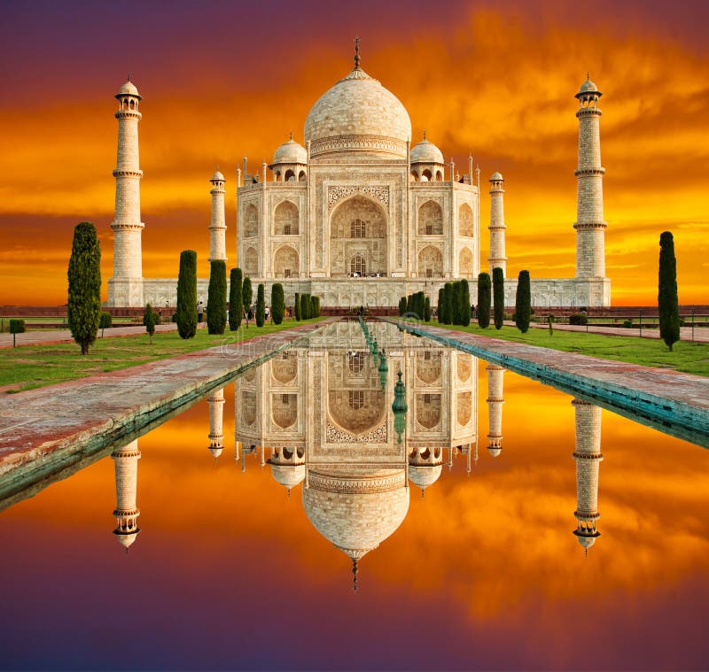 Amazing view on the Taj Mahal in sunset with dramatic sky. The T