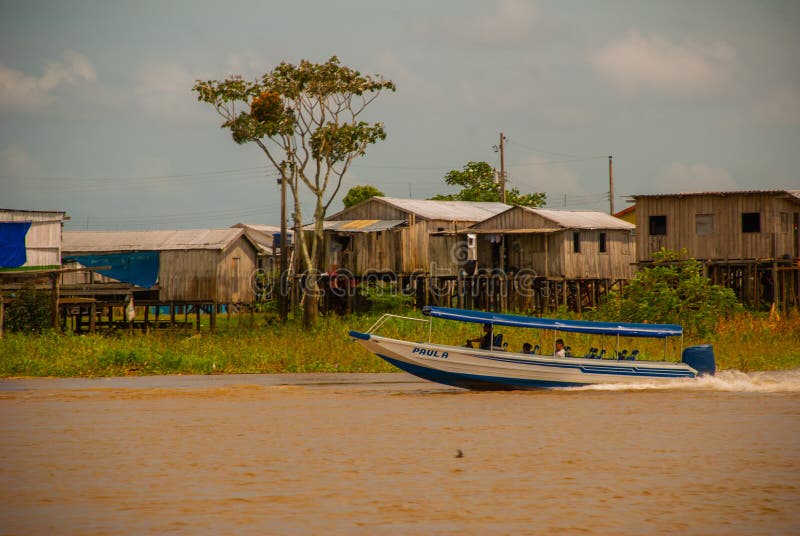 Amazon River, Amazonas, Brazil: Traditional Local Buildings in the ...