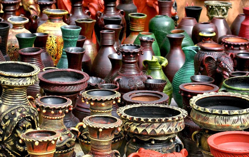 Indian handicrafts- Hand carved decorative ceramic pots. Indian handicrafts- Hand carved decorative ceramic pots