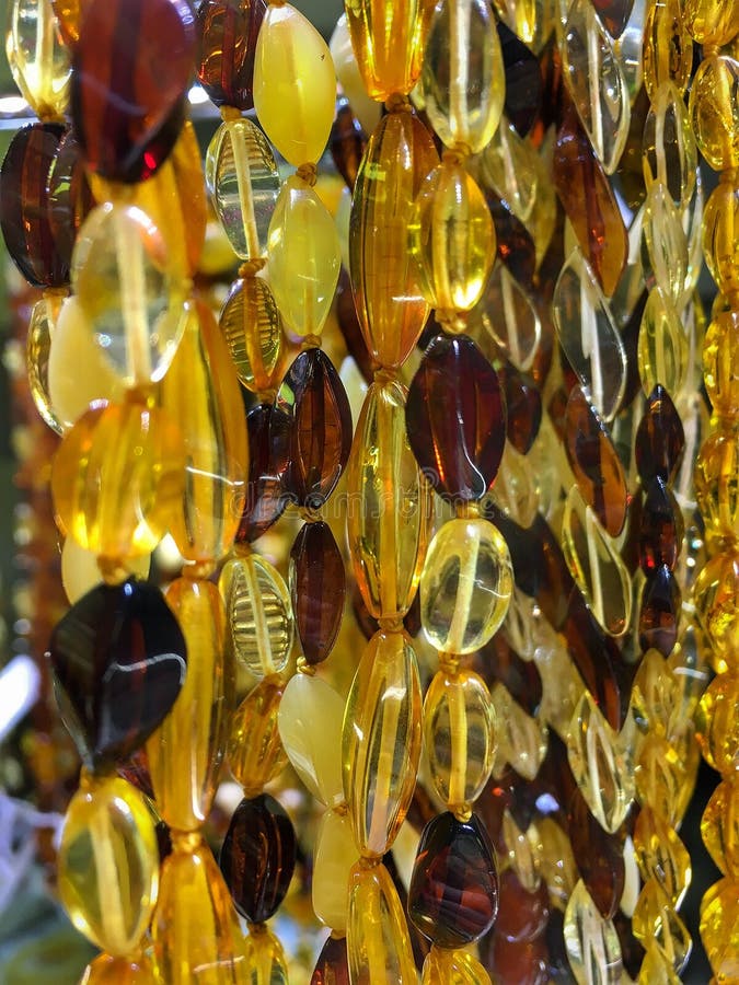 Amber Beads in a Jewelry Store Window. Jewelry Design. Amber Background