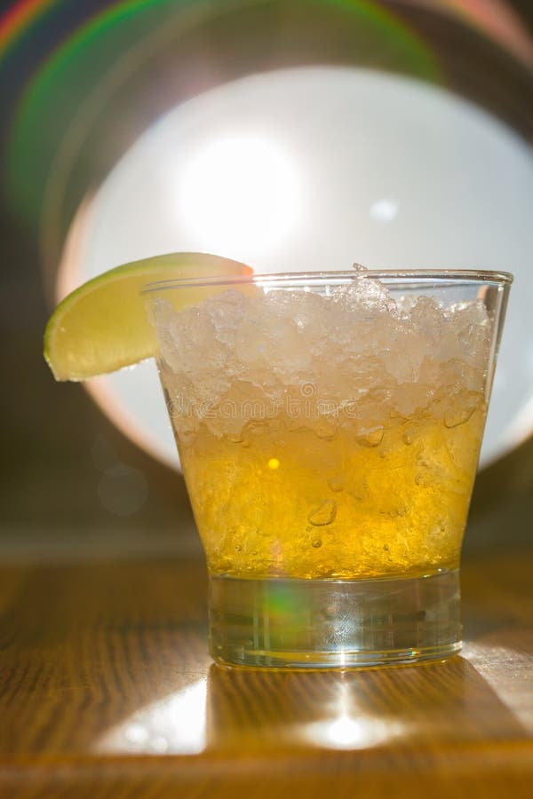 Amber cocktail in a glass stock image. Image of iced - 39476153