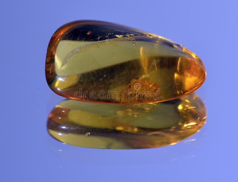 Amber yellow translucent stock image