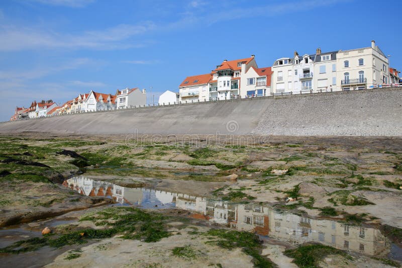 The Beach Of Ambleteuse At Sunset With Colorful Stones And A Fishing ...