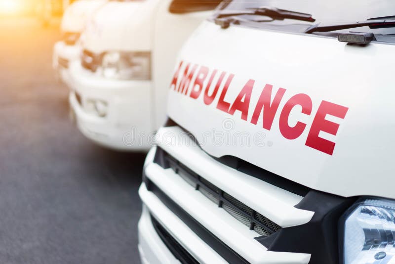 Ambulance parked together to provide assistance to patients.