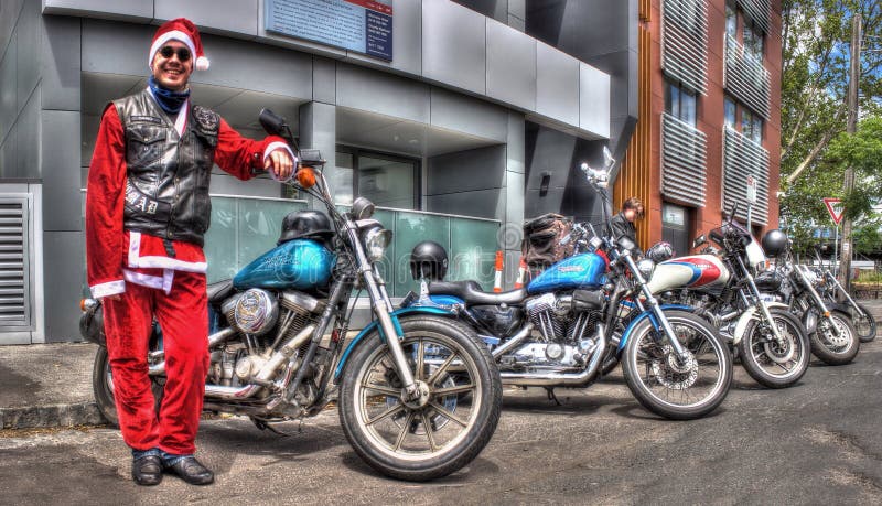 American built Harley Davidson motorcycle and Santa`s little helper royalty free stock image American built Harley Davidson motorcycle and Santa`s little helper royalty free stock image