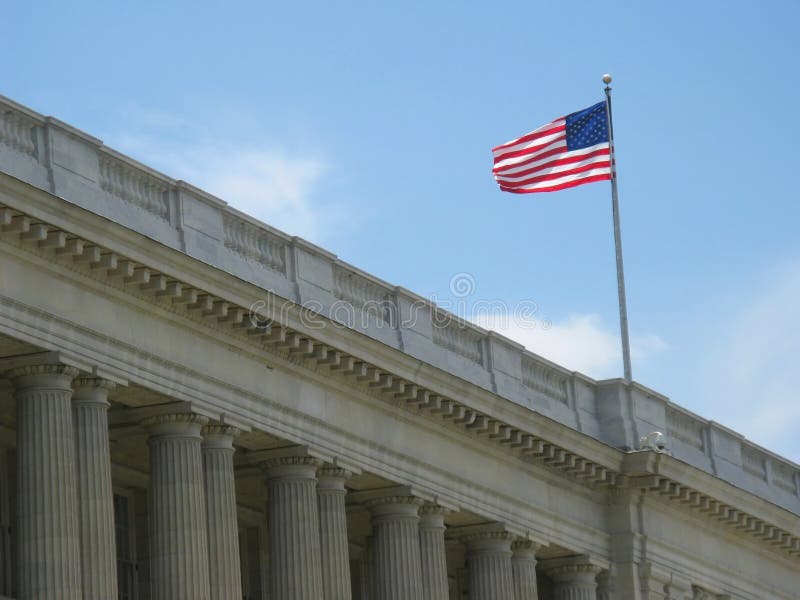 American flag above building