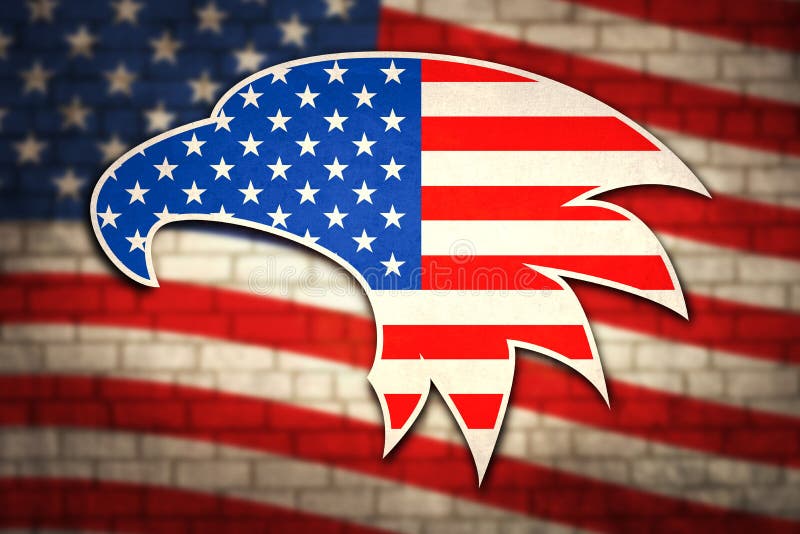 American flag on brick wall with patriotic symbols of the United States of America. Eagle head in front of the flag of the USA on brick wall.